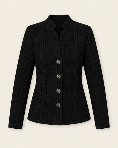 Blazer noir boutonné en maille texturée, packshot sur fond ivoire